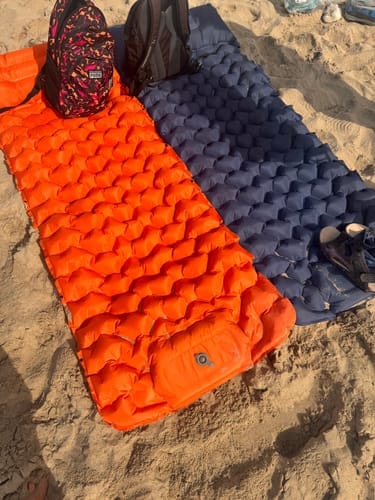 Lounge Mat beside a compact beach bag